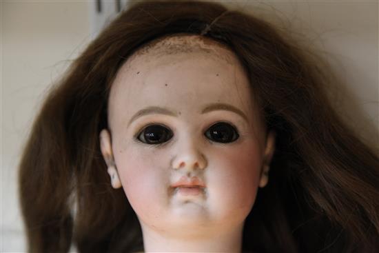 A Jumeau bisque head Bebe doll,